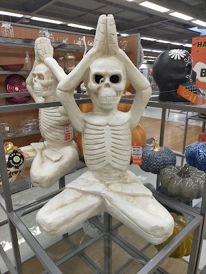 A Halloween Skeleton doing yoga - a fun take on Halloween decor