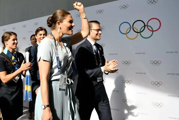 Crown Princess Victoria wore a sunray pleated skirt by Red Valentino and a grey top by Marville Road