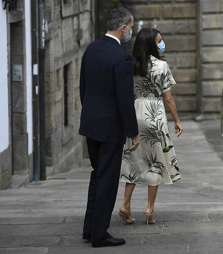 Queen Letizia wore a new printed shirt dress from Pedro del Hierro, and nude patent leather slingback pumps from Carolina Herrera