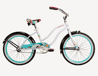 Huffy Bicycle 23555 Girls 20" Good Vibrations Bike, with classic cruiser frame and swept-back handlebars, rear coaster brake, deluxe decorated padded spring saddle, large pedals, 20" whitewall cruiser tires, fenders