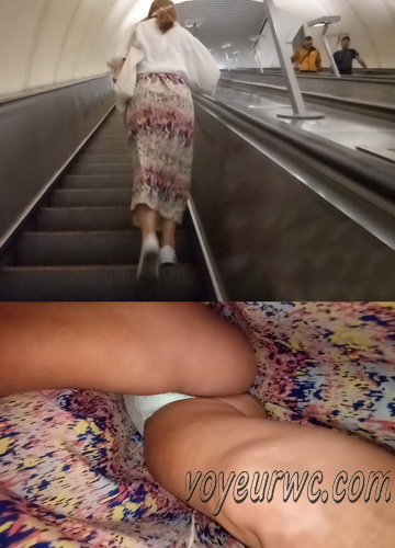 Upskirts N 3038-3047 (Upskirt voyeur videos with girls teasing with their butts on the escalator)