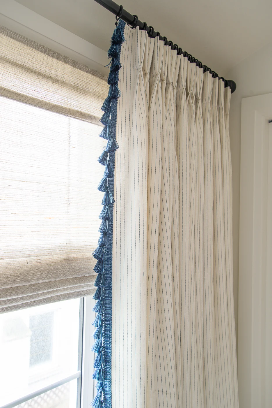 coastal woven blind with drapery panel, drapery panel with tassel trim