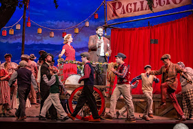 IN REVIEW: soprano SUZANNE KANTORSKI as Nedda (center left), tenor BRANDON SCOTT RUSSELL as Canio (center right), and the cast of Greensboro Opera's November 2019 production of Ruggero Leoncavallo's PAGLIACCI [Photograph by Becky VanderVeen, © by VanderVeen Photography & Greensboro Opera]