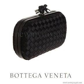 Queen Letizia Carried Bottega Veneta black knot intrecciato satin clutch