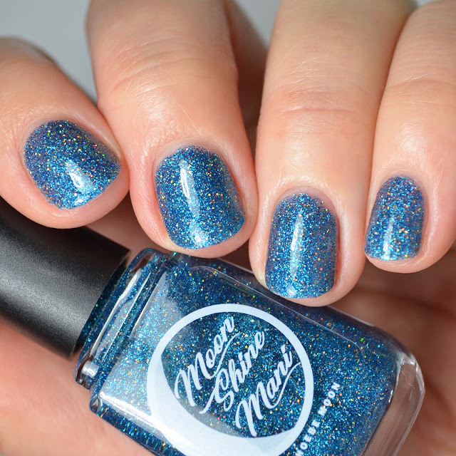 blue micro glitter and gold holographic micro glitter nail polish swatch