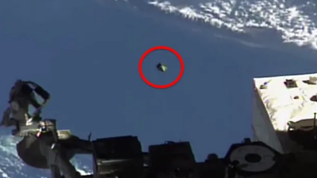 Huge cone shaped UFO following the ISS.