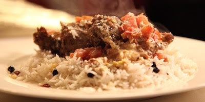 Slow cooked lamb with fetta and tomatoes, pilaf and fatoush salad