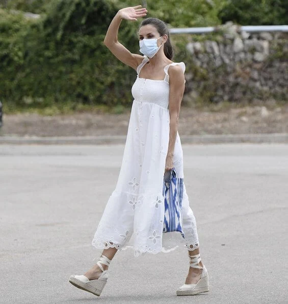 Queen Letizia wore Uterque organza dress with embroidery. Queen Letizia wore a new Macarena espadrille wedges. Queen will also go to Ibiza