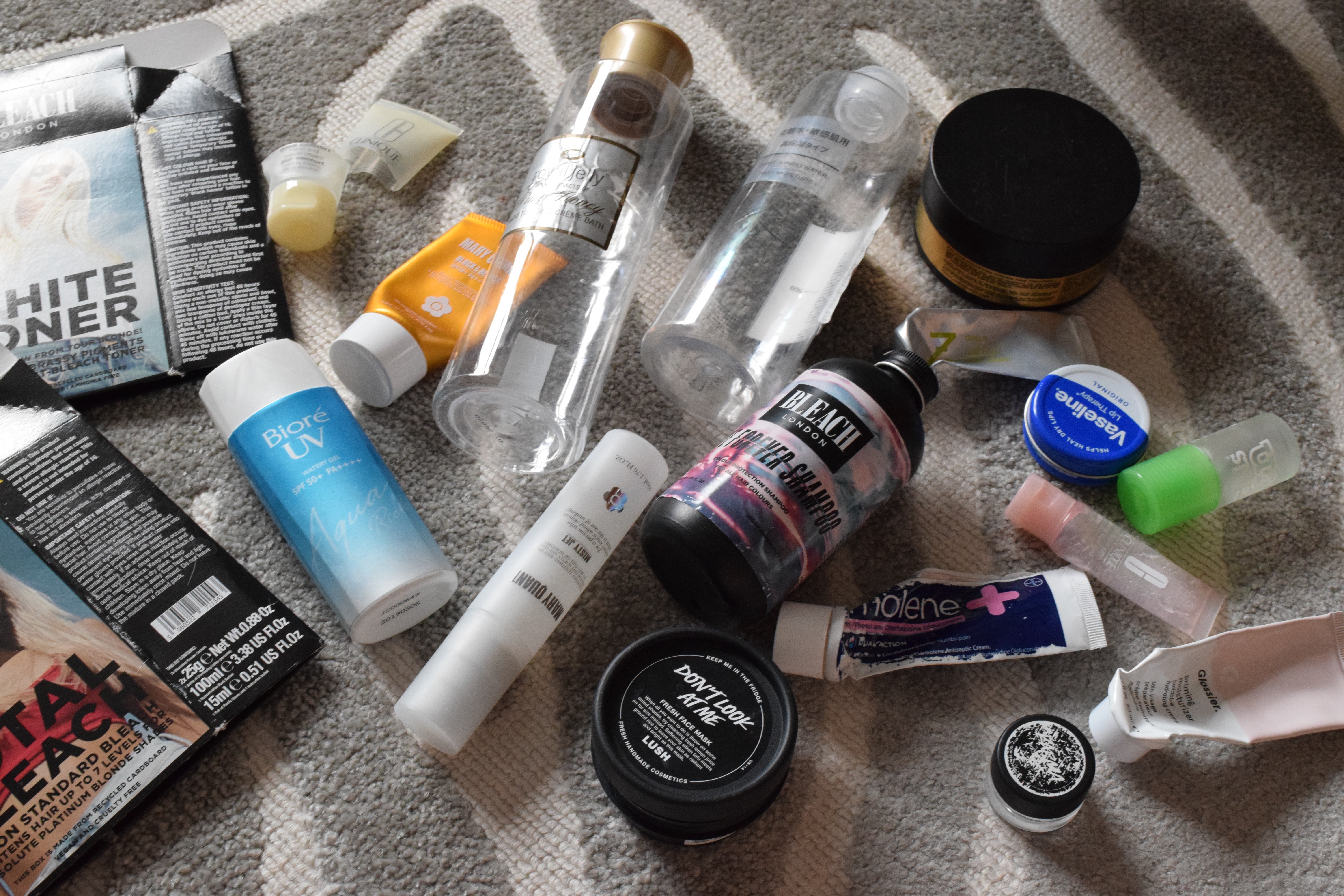 Empty products from brands including Clinique, Mary Quant, Bleach London and Lush