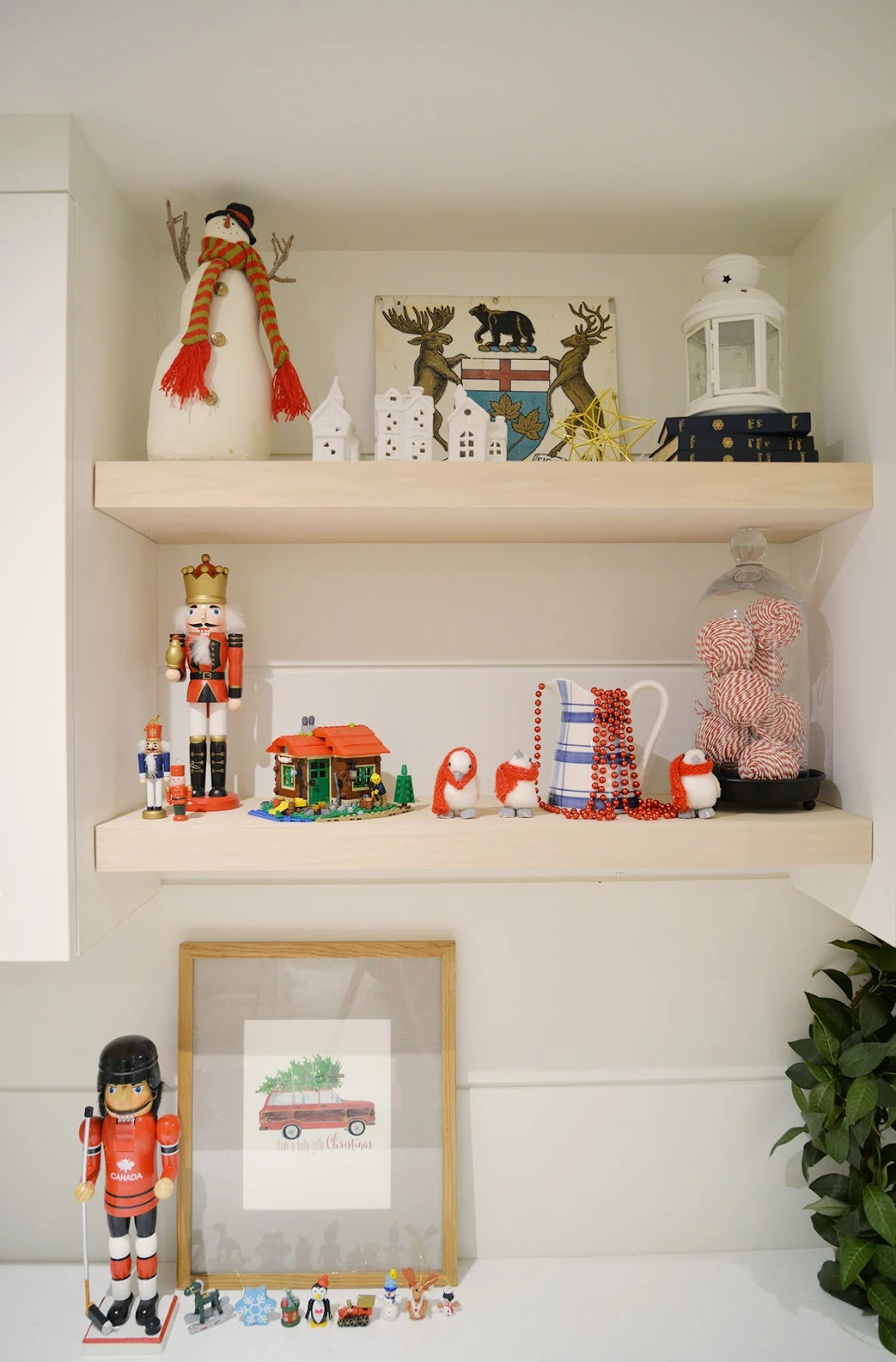 open shelving, wood shelves with whimsical Christmas decorations