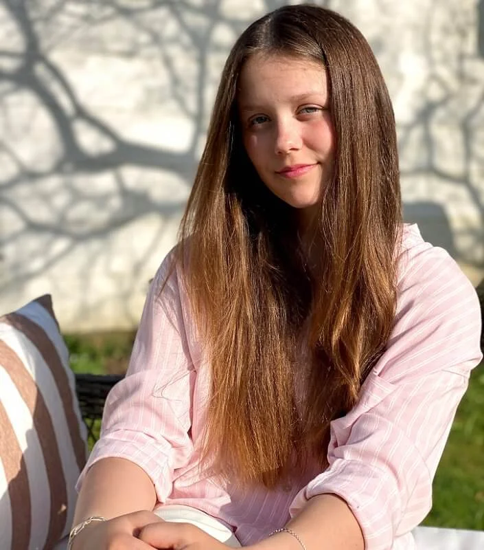 Pink blouse and white trousers. Princess Isabella is second child of Crown Prince Frederik and Crown Princess Mary