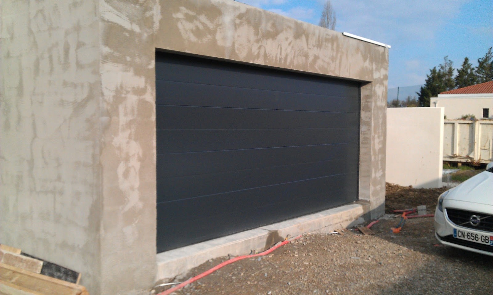 Porte De Garage Surelevation A Ossature Bois En Auto Construction