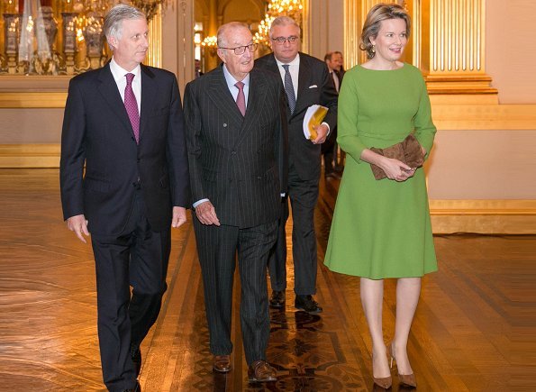 King Philippe, Queen Mathilde, King Albert and Prince Laurent at Combating Human Trafficking seminar. Natan dress