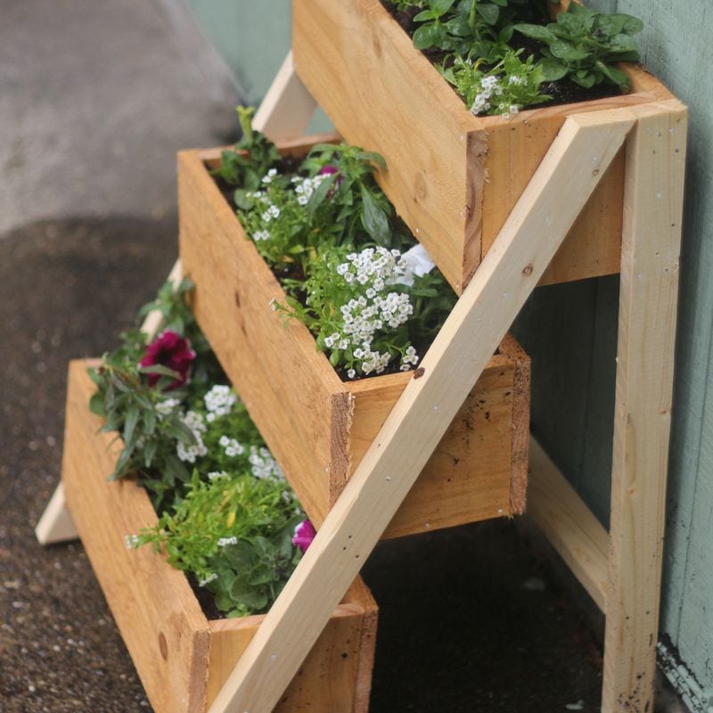 wooden planter on stairs