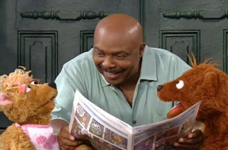 Gordon is reading a book for Baby Bear and Curly Bear. Sesame Street Elmo's Potty Time