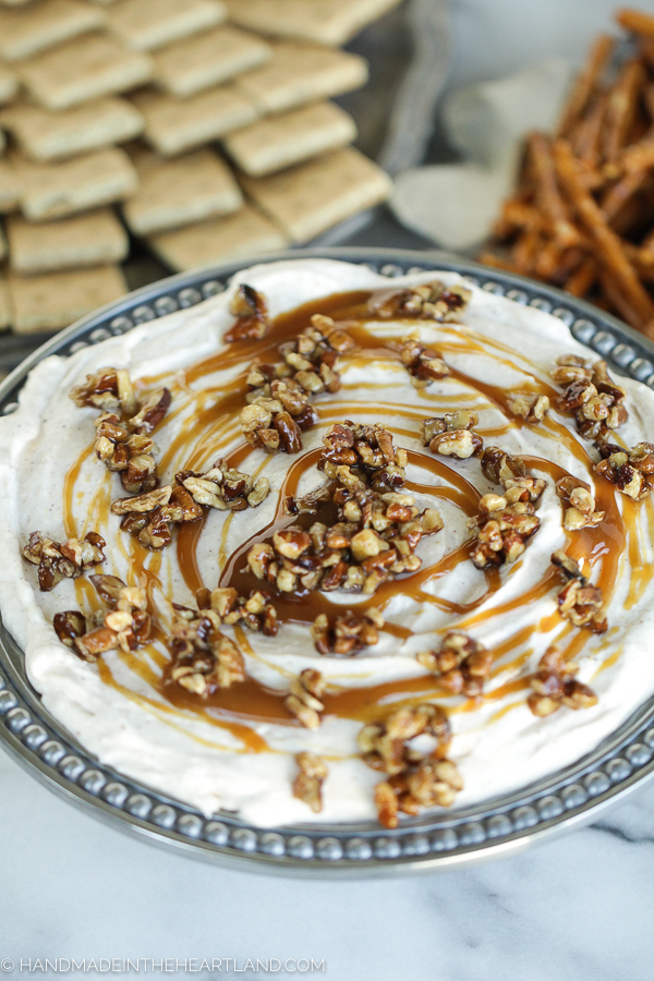 Make this easy pumpkin cheesecake dip with caramel and pecans for Thanksgiving dessert!