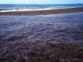 Sea Water Wave And River Beach Outlet View On A Sunny Day At The Village North Bali Indonesia