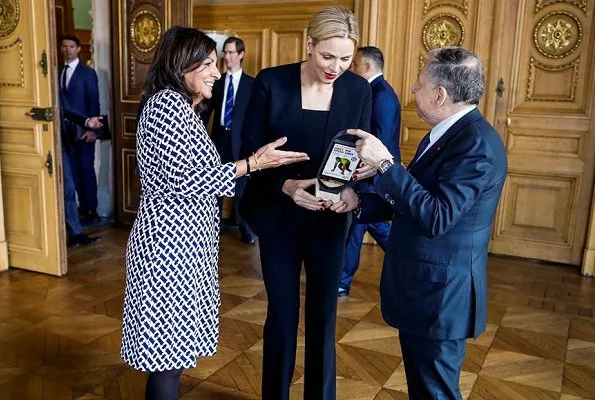 Princess Charlene and other members were received by French President Emmanuel Macron and his wife Brigitte Macron at l'Elysée Palace