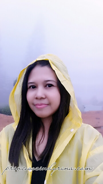 woman in raincoat
