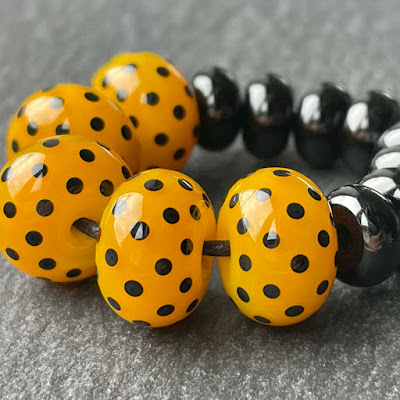 Handmade lampwork glass beads made with Creation is Messy Scotch Broom