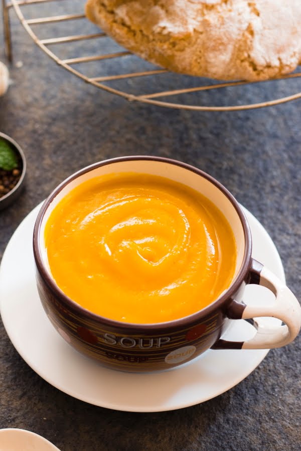 How to make creamy pumpkin soup recipe at www.oneteaspoonoflife.com