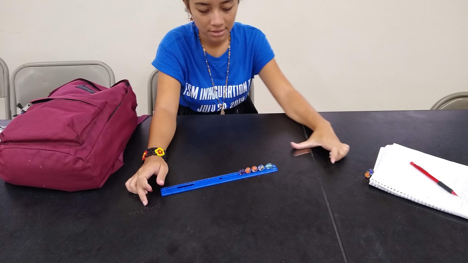 Constructing knowledge of the conservation of momentum using marbles