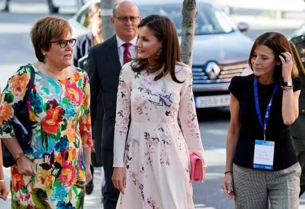 Queen Letizia wore Asos Design Tall floral and bird embroidery midi dress, wore pink suade pumps and pink clutch