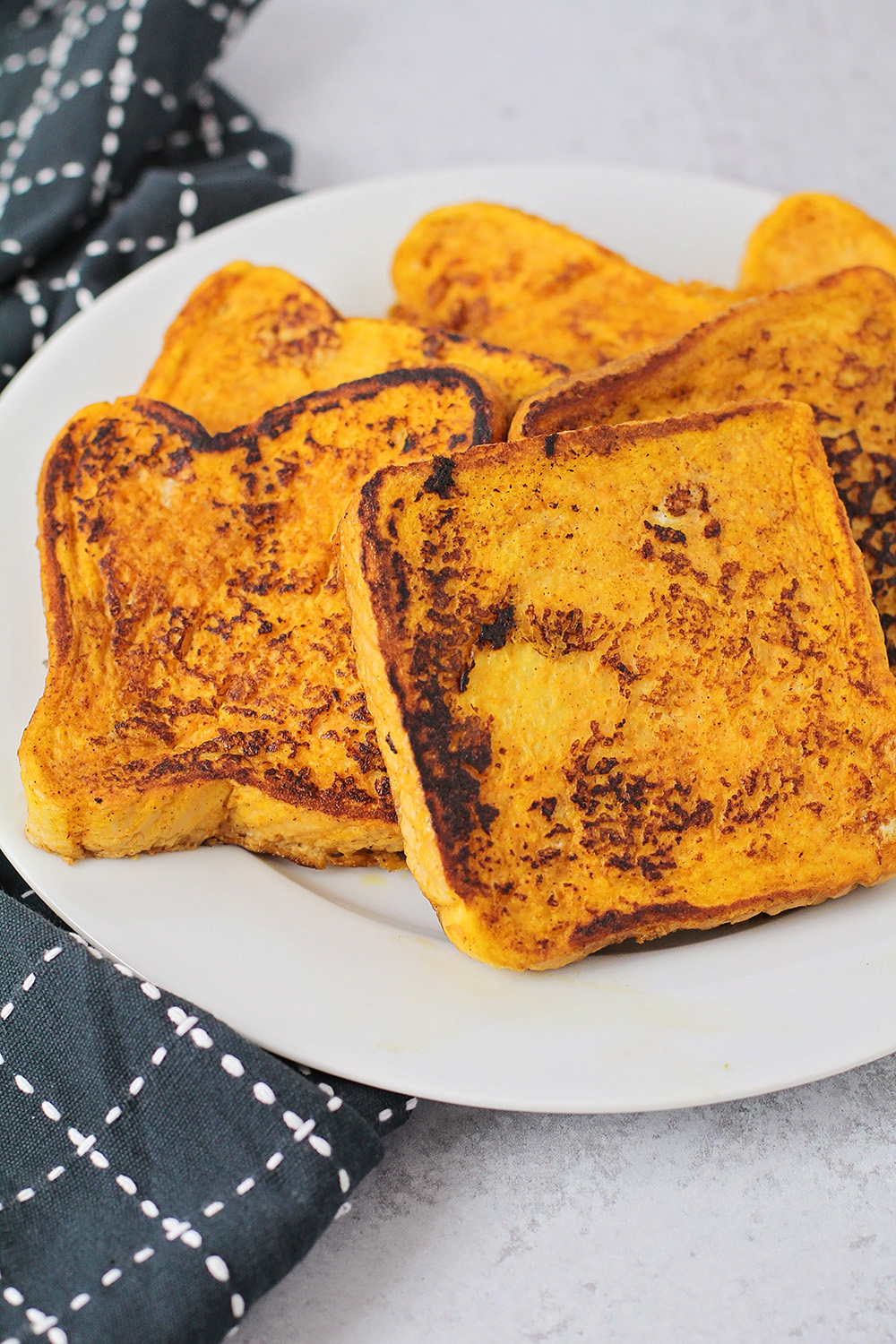 This pumpkin french toast is super easy to make, and incredibly delicious. It's the perfect fall breakfast!