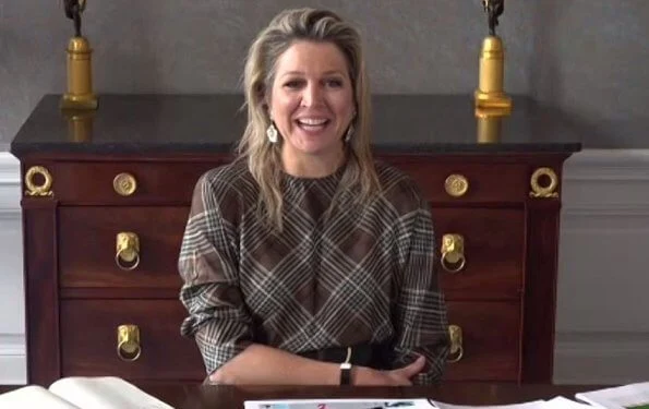 Queen Maxima wore a Naboo checked silk twill dress, Nico blouse and niky skirt from Natan