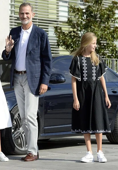 Queen Letizia wore Mango print trousers. Princess Leonor wore an embroidered dress by Mango. Sofia wore an embroidered dress by Mango