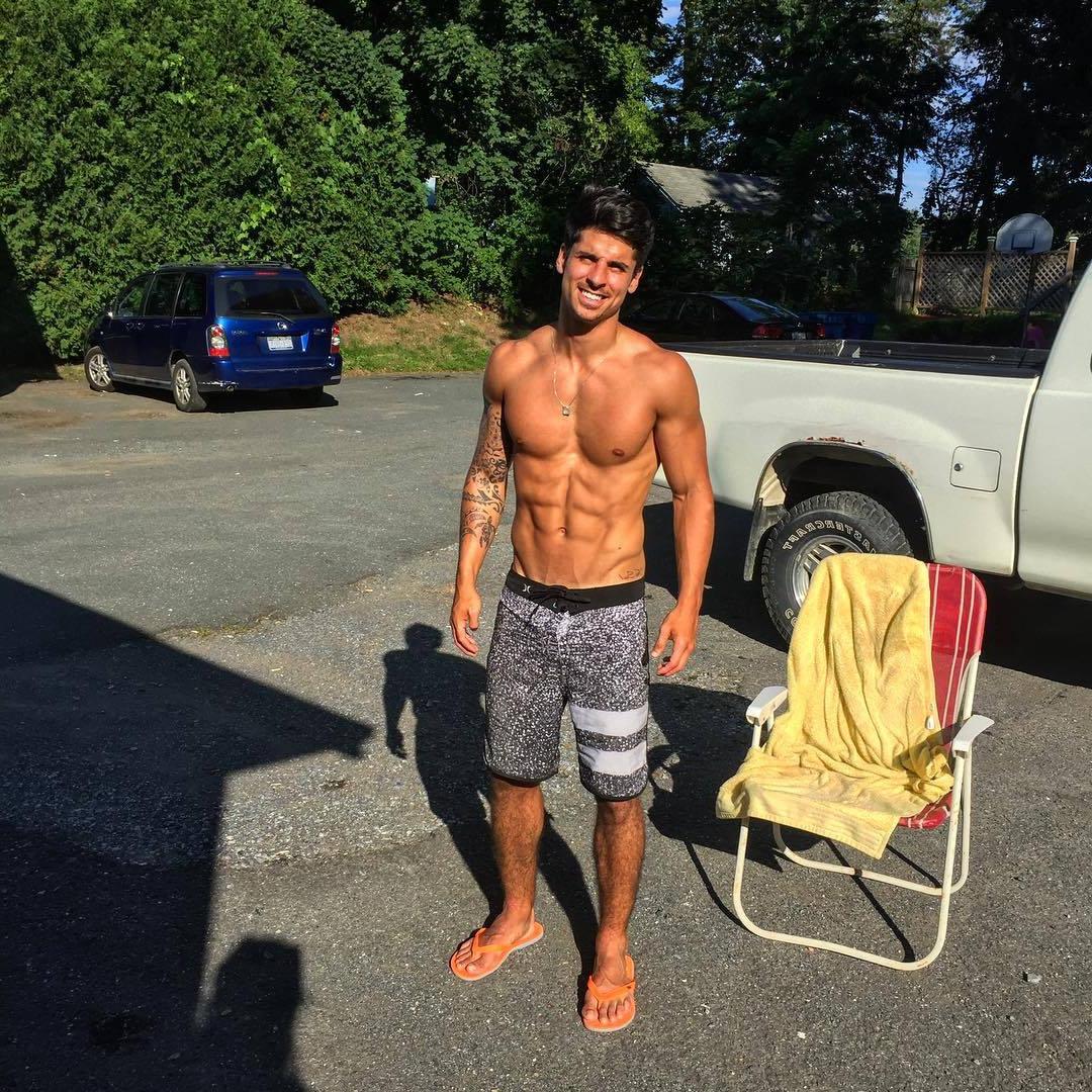 attractive-fit-spanish-young-men-smiling-abs-hairy-legs-flip-flops