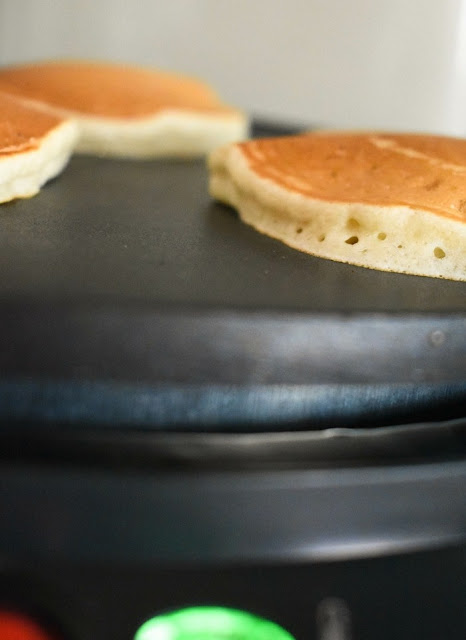 Scotch pancakes cooked on an electric crepe maker