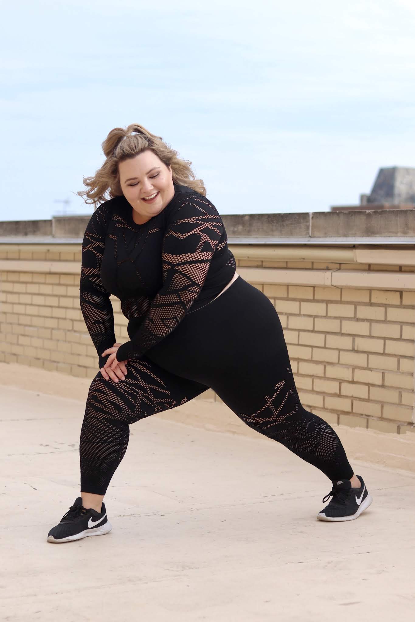 Chicago Plus Size Petite Fashion Blogger and model Natalie Craig Natalie in the City shares cute plus size workout sets Fabletics VIP