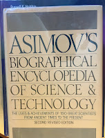 Asimov’s Biographical Encyclopedia of Science and Technology, superimposed on the cover of Intermediate Physics for Medicine and Biology.