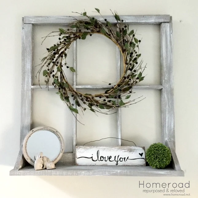 Making a window shelf with an old chippy window and a wreath. 