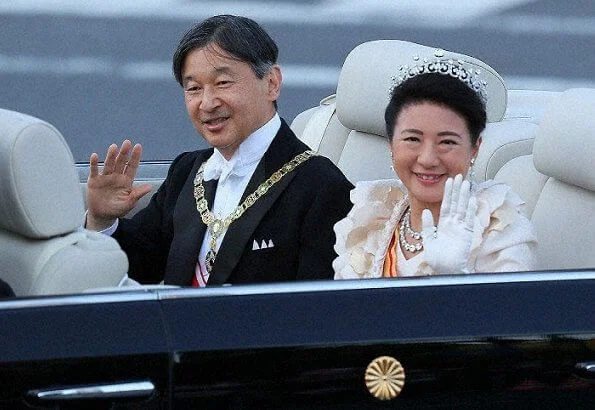 Empress Masako was dressed in a long white dress with a diamond tiara and a medal. Crown Prince Akishino and Crown Princess Kiko