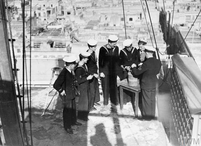 Malta sailors draw their rum ration, 23 February 1942 worldwartwo.filminspector.com