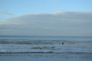 the colors of the sunset at low tide along the east coast of zanzibar