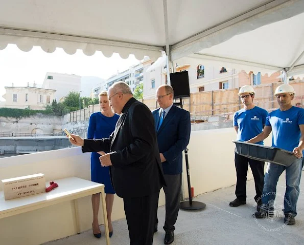 Prince Albert and Princess Charlene at François D'Assise Nicolas Barré Princess Charlene wore Roland Mouret dress