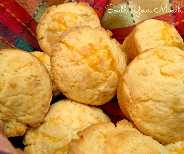 Cheddar Cheese Muffins! A quick recipe for light, fluffy, EASY homemade cheddar cheese muffins perfect for serving hot, fresh bread with any meal.