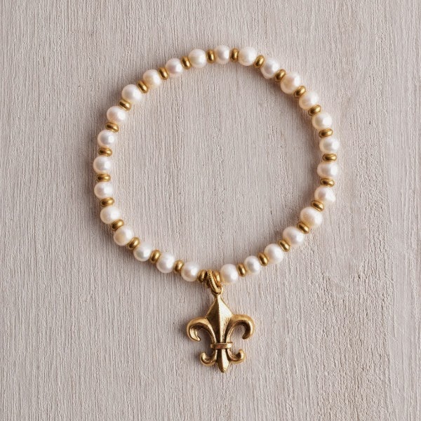 http://www.whitetrufflestudio.com/collections/bracelets/products/white-truffle-fleur-de-lis-pearl-bracelet