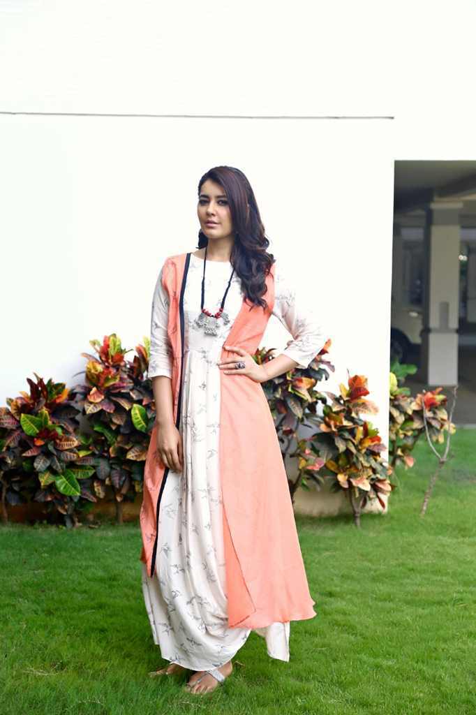 Tollywood Actress Rashi Khanna Photo shoot Images in Orange Top White Dress