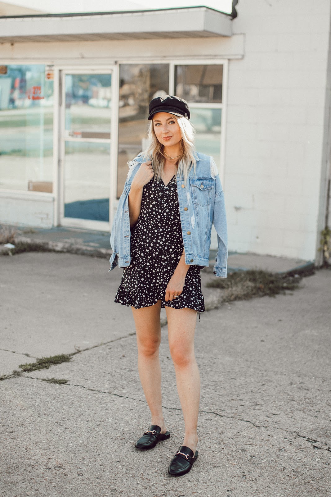 wrap dress styled for fall w/ a denim jacket, captain's cap and loafers