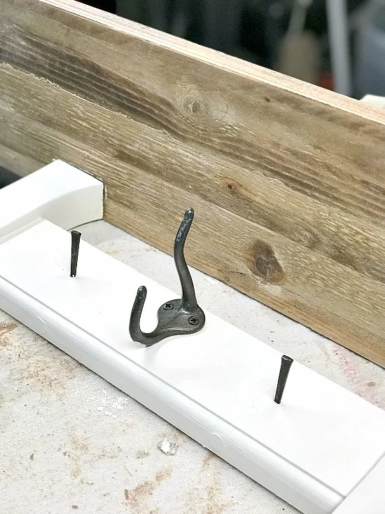 Adding hooks to the chair shelf.