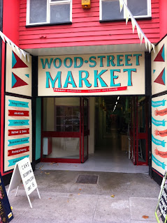 Exterior shot of Wood Street Market signage