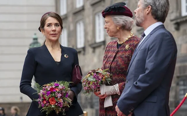 Crown Princess Mary wore a crepe knit wrap jacket by Scanlan Theodore. Queen Margrethe, Princess Benedikte, Prince Frederik