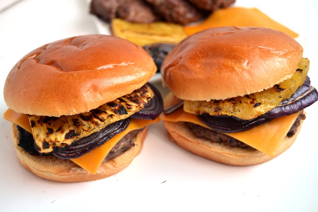 Hawaiian Teriyaki Steak Burgers feature freshly ground burgers, flavorful teriyaki sauce, grilled pineapple and red onions and melted cheddar cheese. www.nutritionistreviews.com