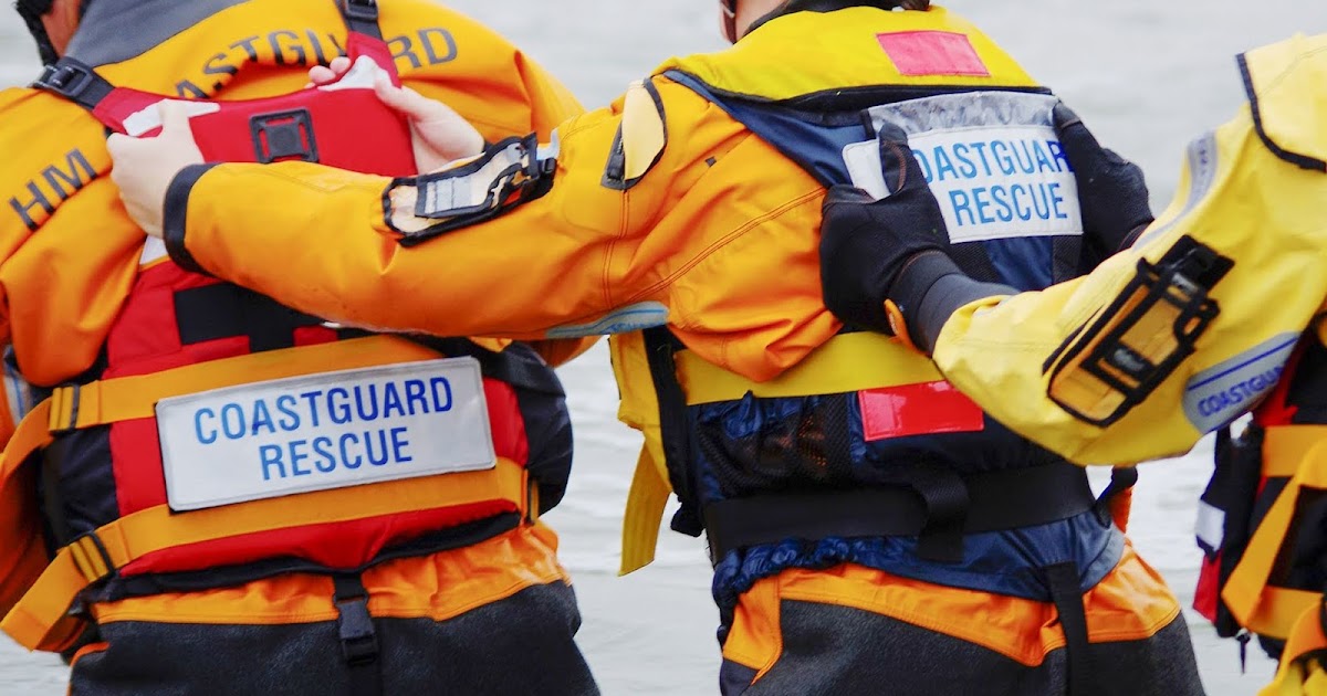 Three people rescued from the water after their vessel ran aground.