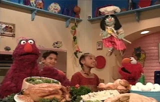 Jean the Genie, Elmo and Telly sing a song. Sesame Street Elmo's Magic Cookbook