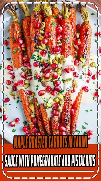 Sweet maple roasted carrots served topped with a tasty tahini sauce, pomegranate and pistachios!
